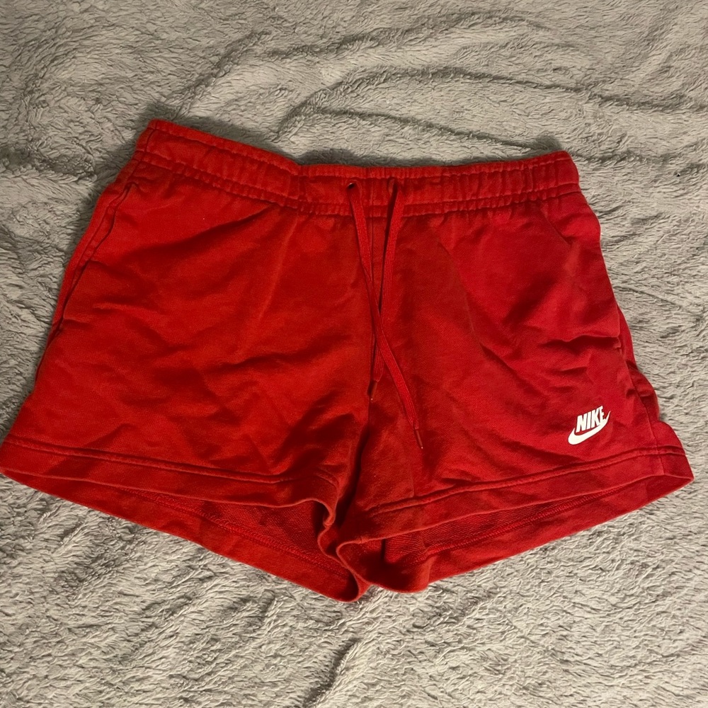 Red Nike shorts